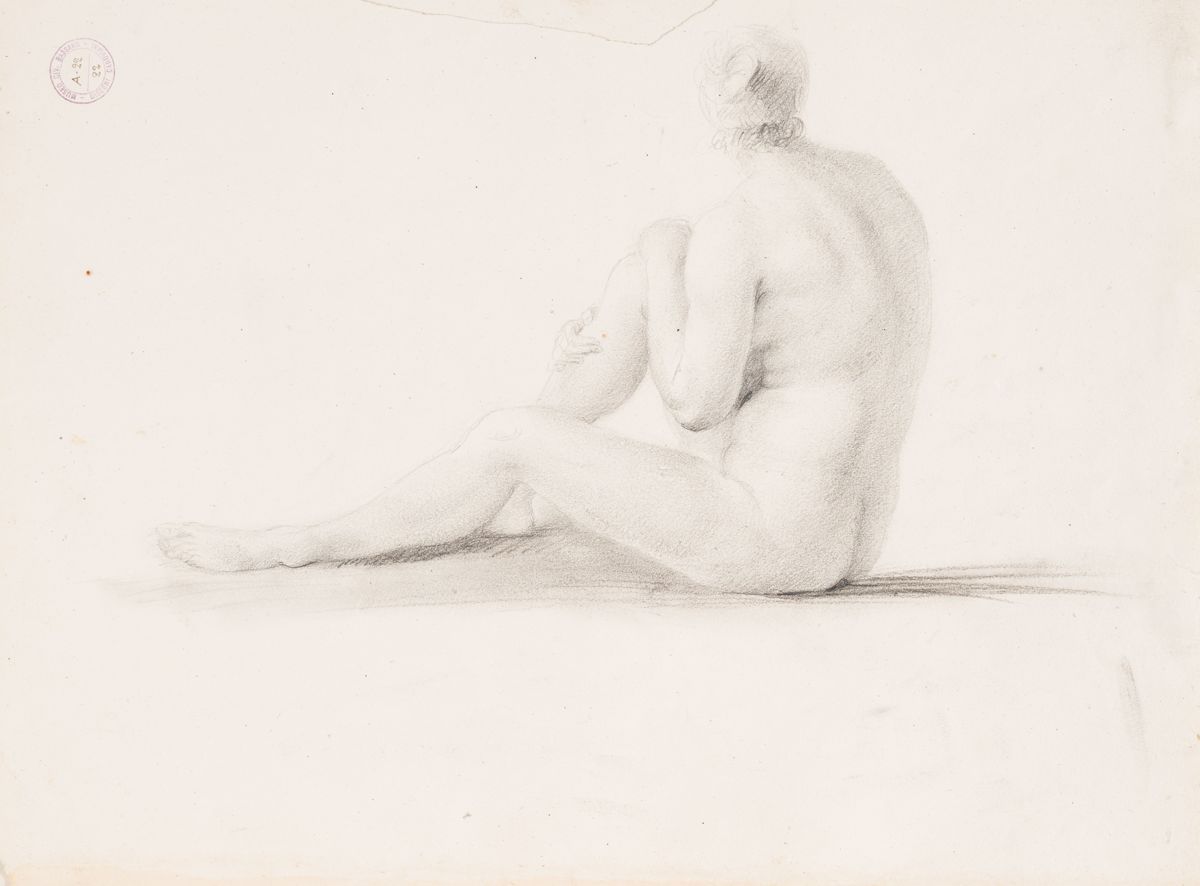 Nudo femminile di schiena seduto a terra